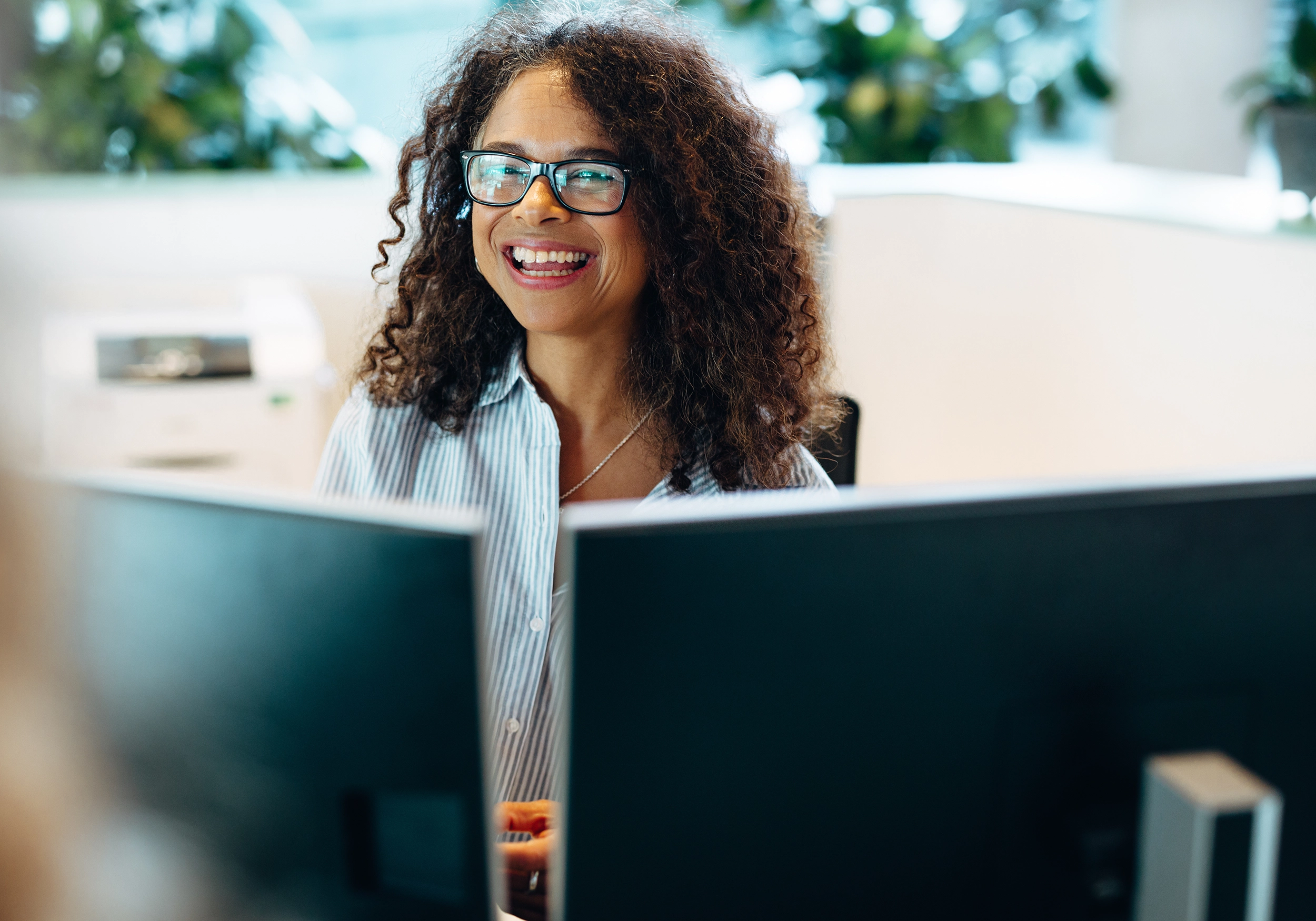 woman at workplace using nimbus workforce management system